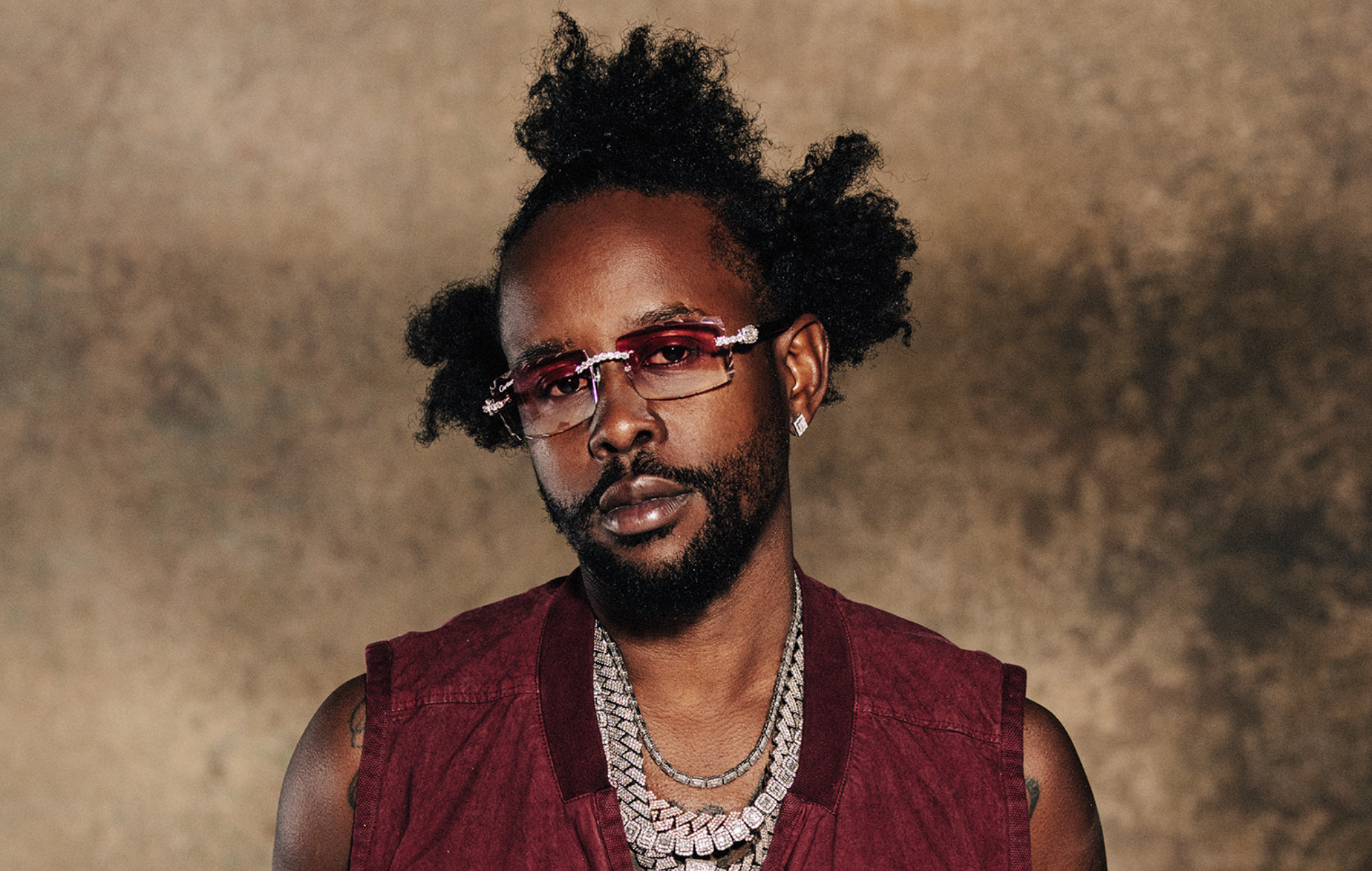 Unruly Boss Unleashed: Popcaan Secures U.S. Visa and Touches Down in Florida thumbnail